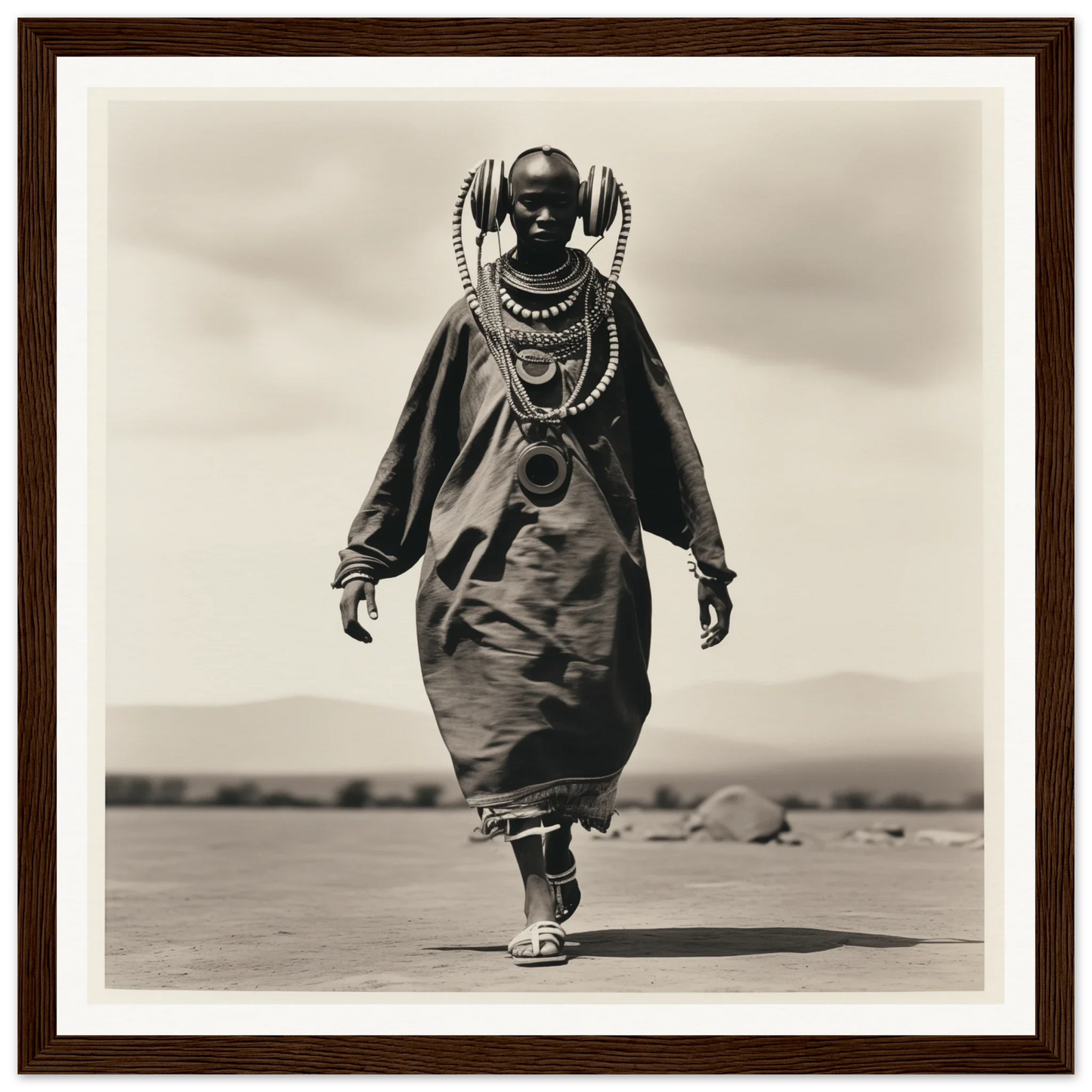 Black and white photo of a Maasai person in traditional dress for Timeless Tribal Steps