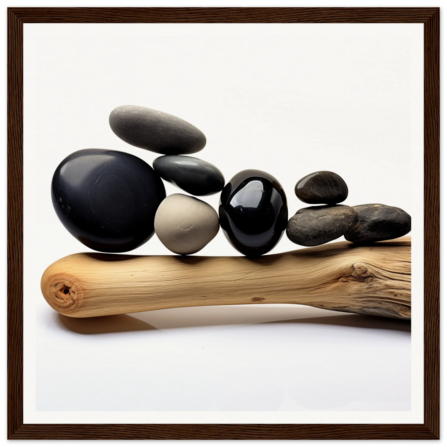 Smooth river rocks on driftwood in Zen Balance Riffs special edition art display