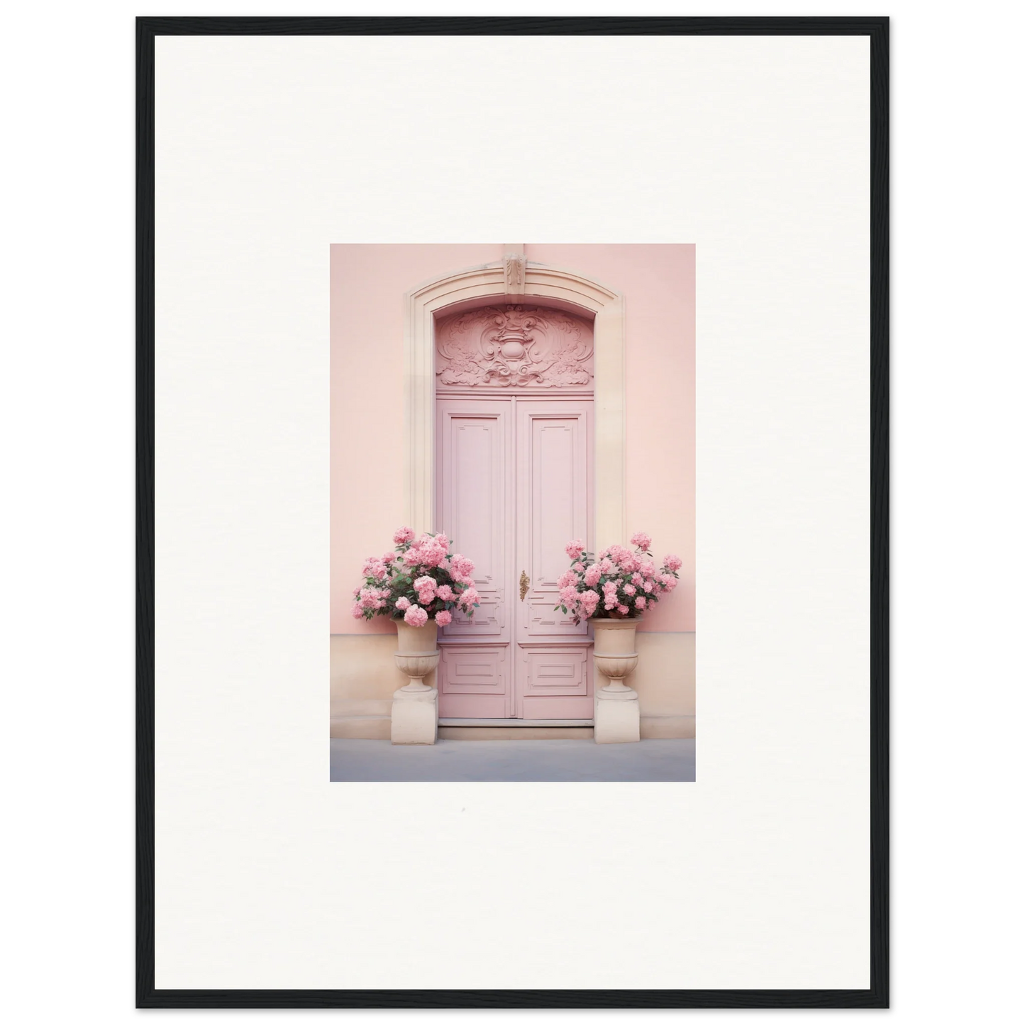 Pink wooden door with carvings next to floral arrangements for Rosy Cosmos Gateway