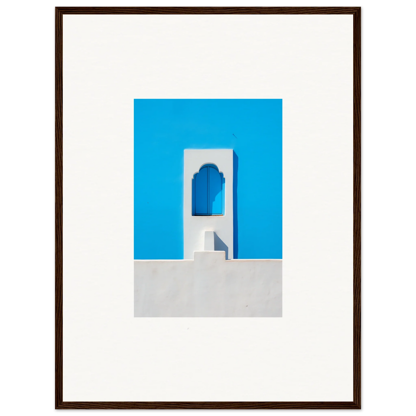 Minimalist photo of Oikos Cerulean Aperturearches with a white bell tower and blue sky