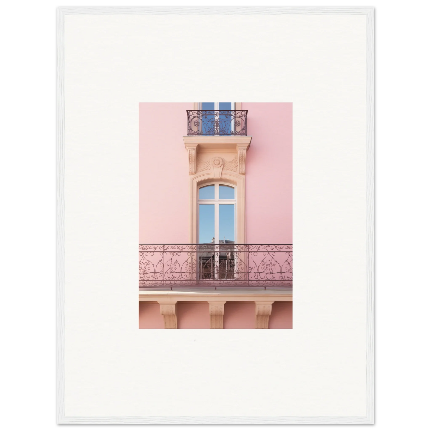 Pink balcony with ornate railings and arched window featuring Dusky Dream Balustrade