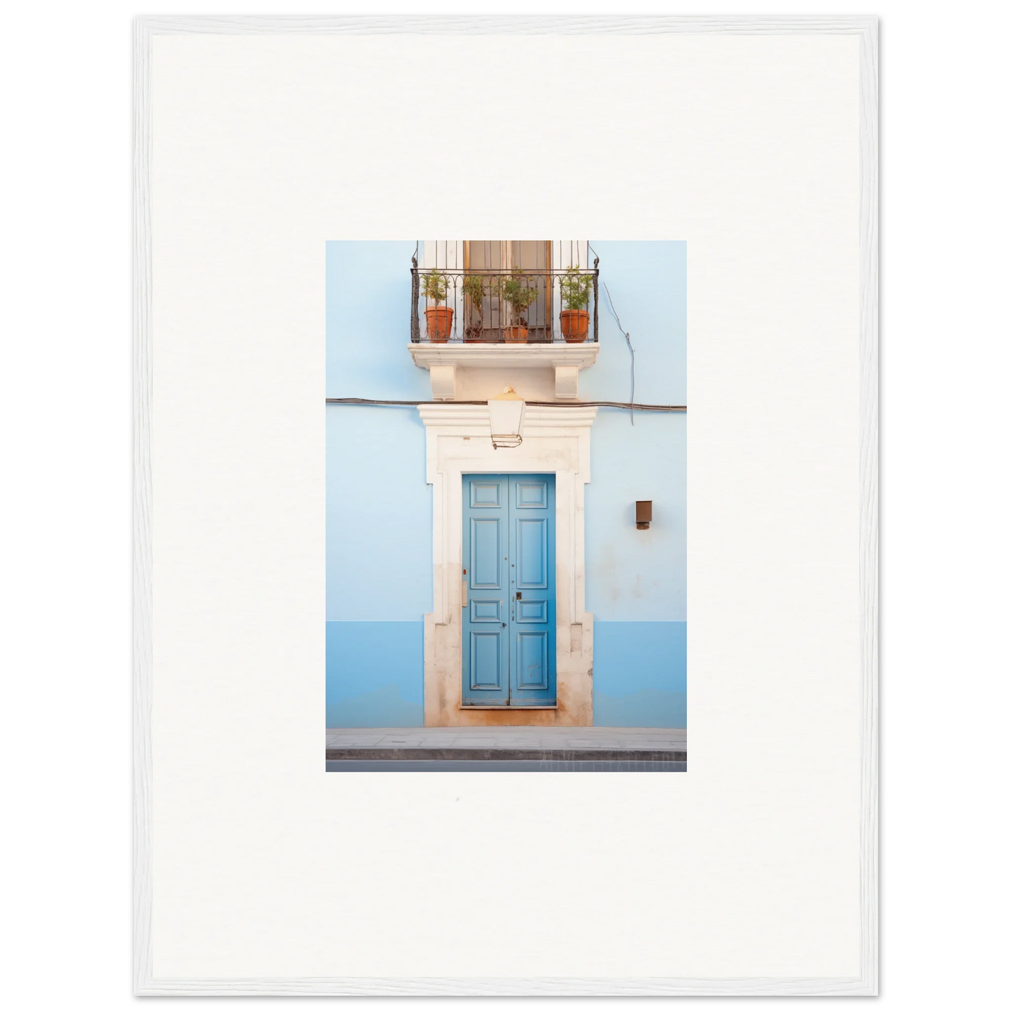 Blue wooden door with white stone frame, potted plants, showcasing Ethereal Azul Entrance