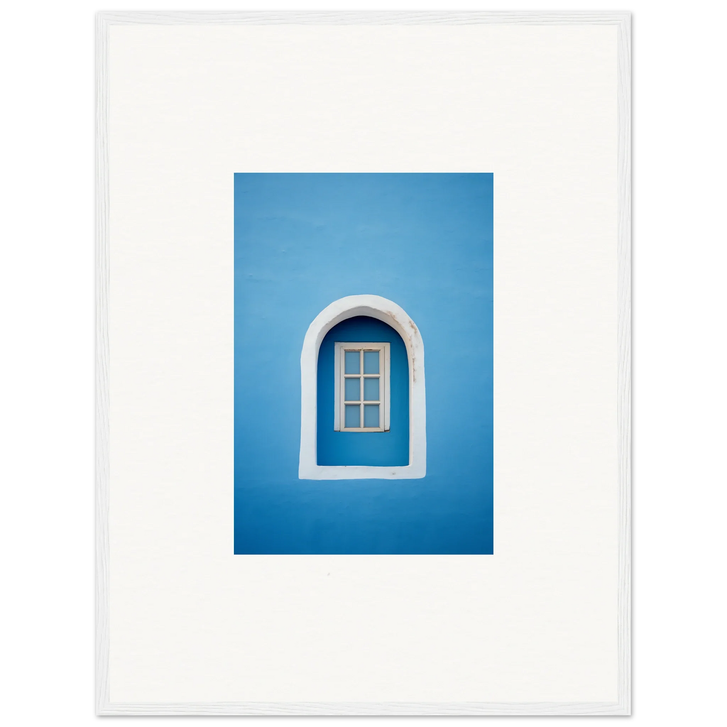 Arched white window frame on blue wall showcasing Whispers Sky Mosaic art piece