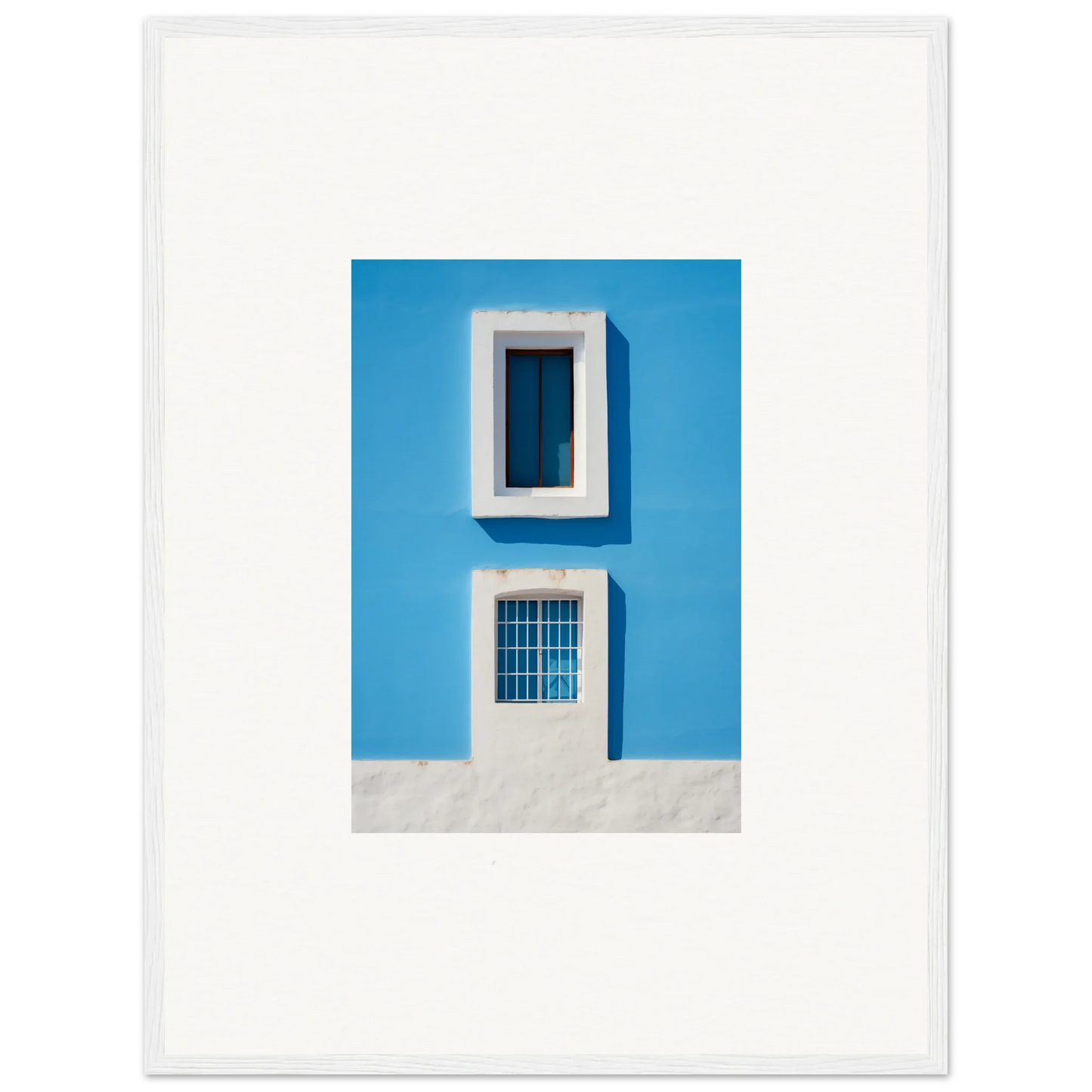 Two white-framed windows on a bright blue wall from Isles Encompassed Vista art