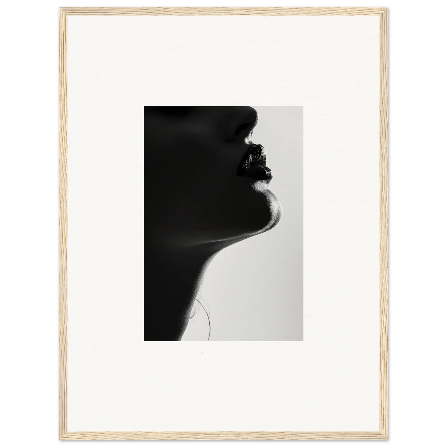 Dramatic black and white silhouette profile in Shadowed Whisper Immanence framed wall art