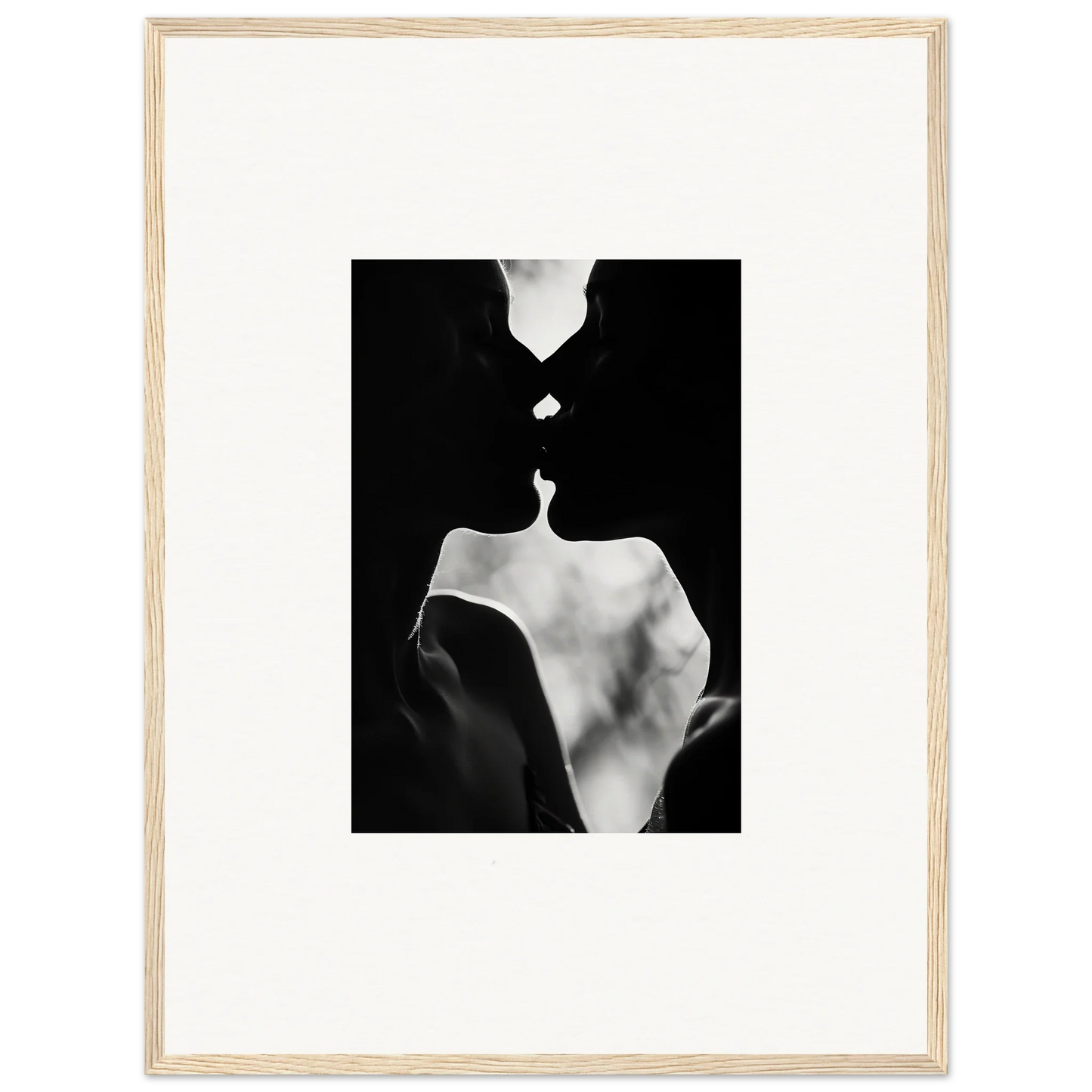 Black and white silhouette of kissing figures in Shadowy Dawn Nuance framed wall art