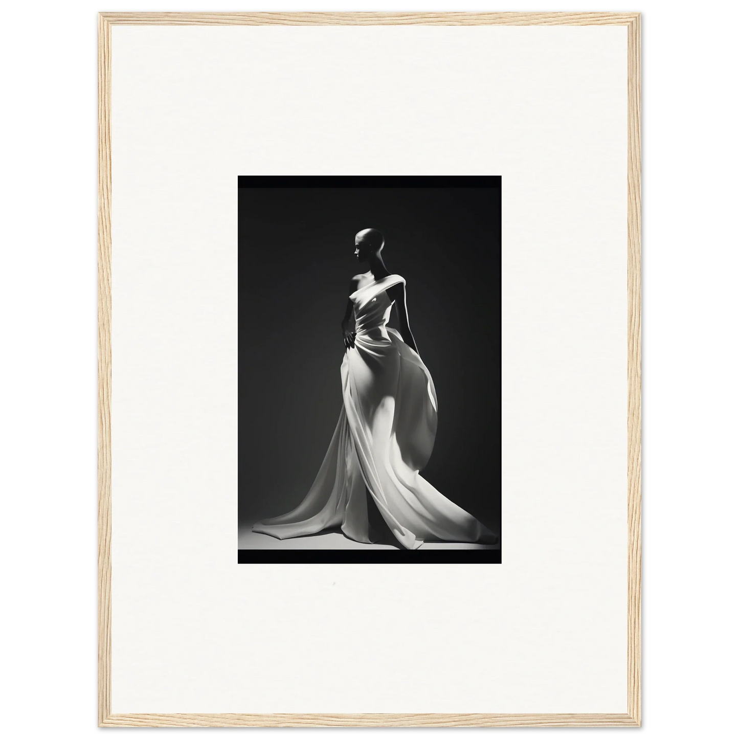 Elegant black and white photo of Gossamer Ivory Whispers evening gown with dramatic draping