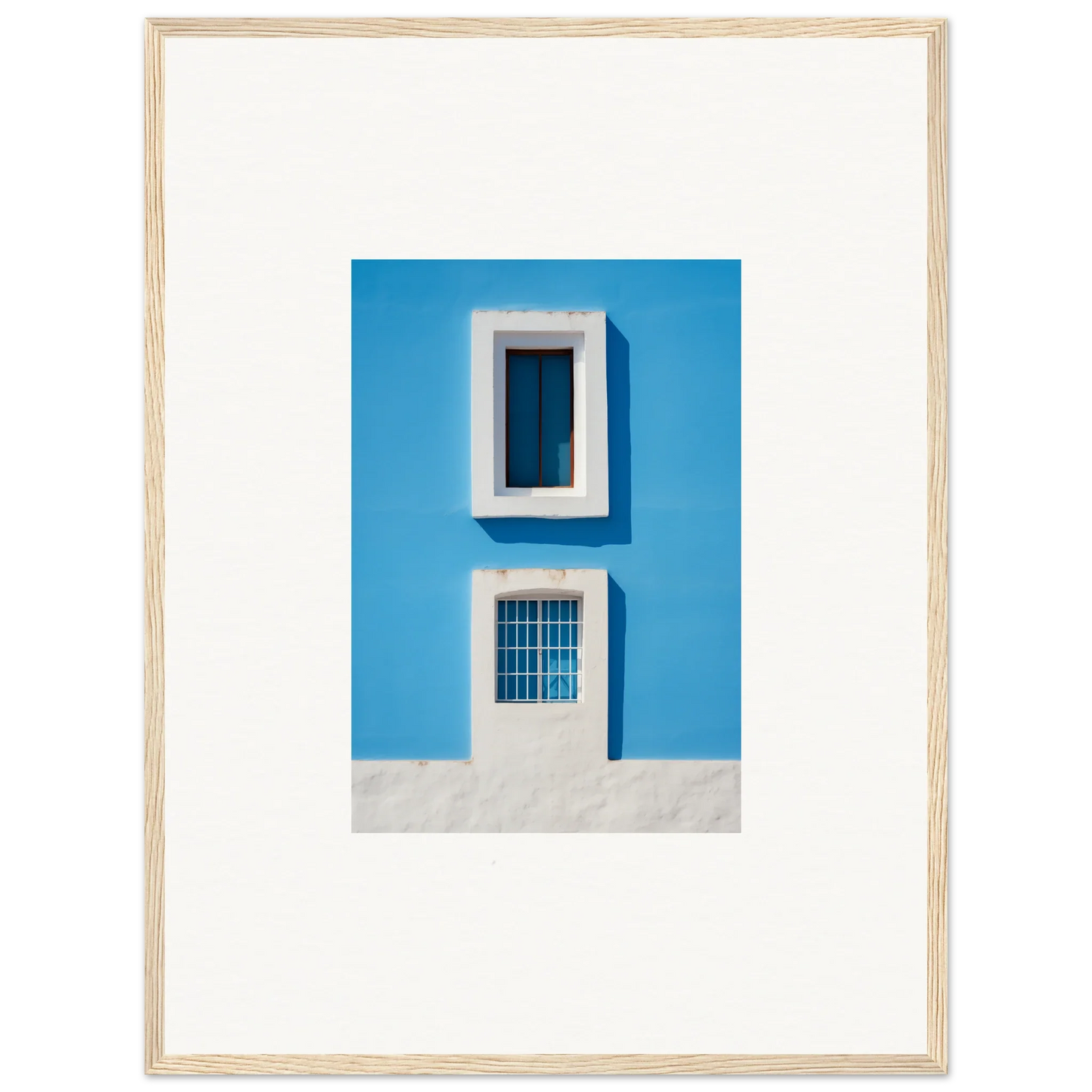 Framed wall art of Isles Encompassed Vista featuring a bright blue wall and white windows