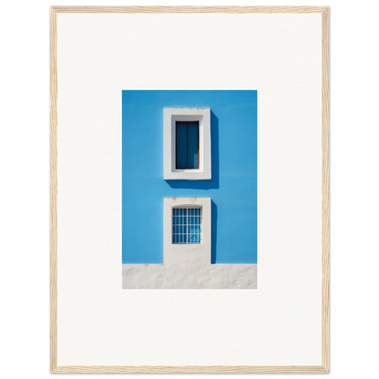 Framed wall art of Isles Encompassed Vista featuring a bright blue wall and white windows