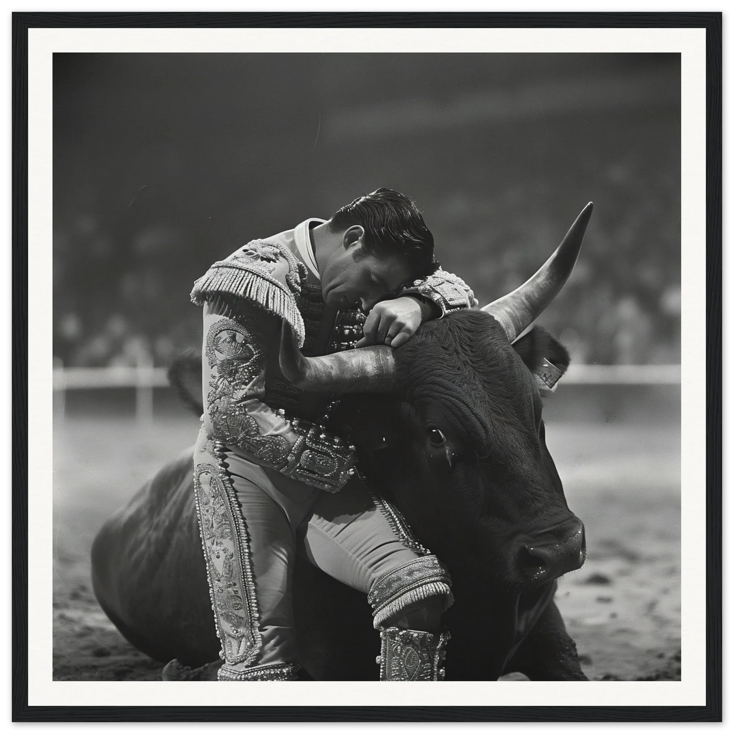 A matador in an ornate suit faces off with a bull in this framed wall art special edition