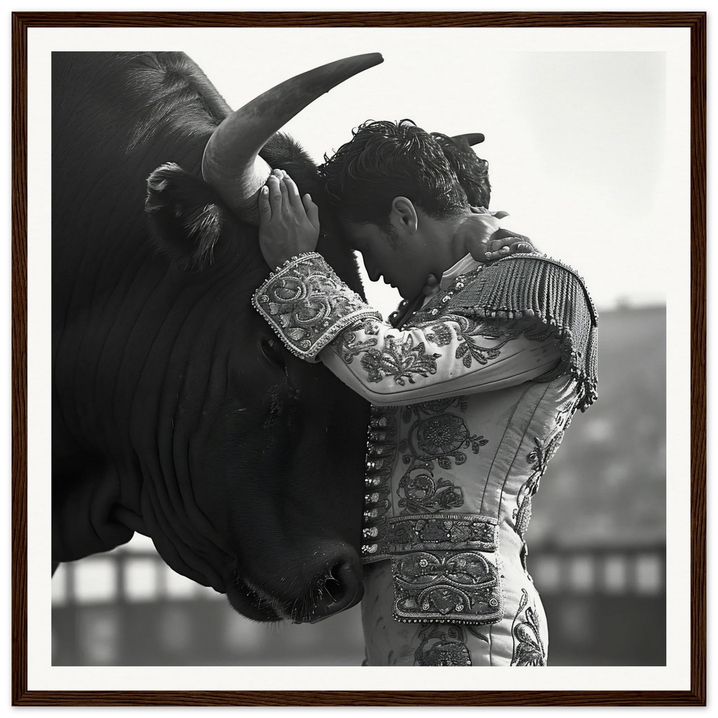 Matador in ornate suit faces bull in black and white for Bull’s Forehead Commune art