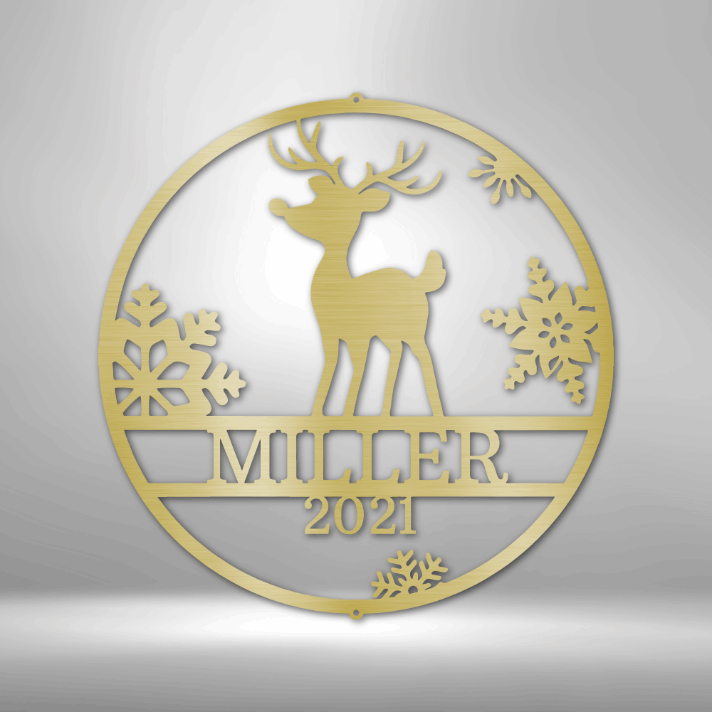 Circular gold ornament featuring a reindeer silhouette, snowflakes, and ’MILLER 2021’’ text.