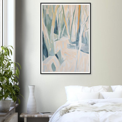 Framed wall art of abstract trees above a bed with white bedding; a vase adds charm.