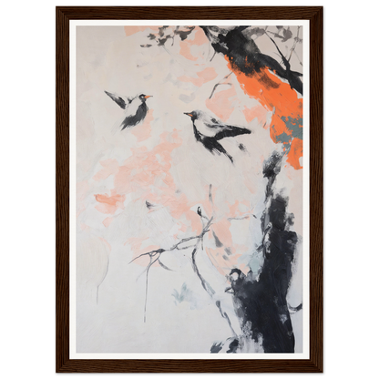 Framed wall art of birds soaring by branches, with pink and orange accents.