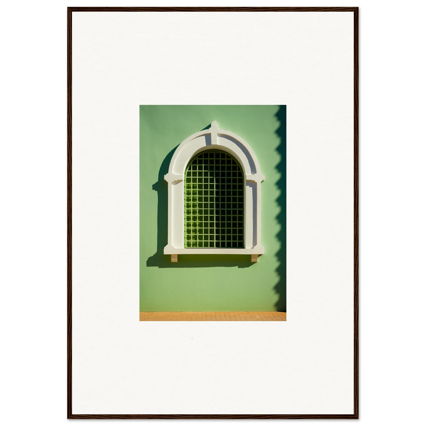 Arched Visible Equilibrium Window with decorative trim and green gridded glass