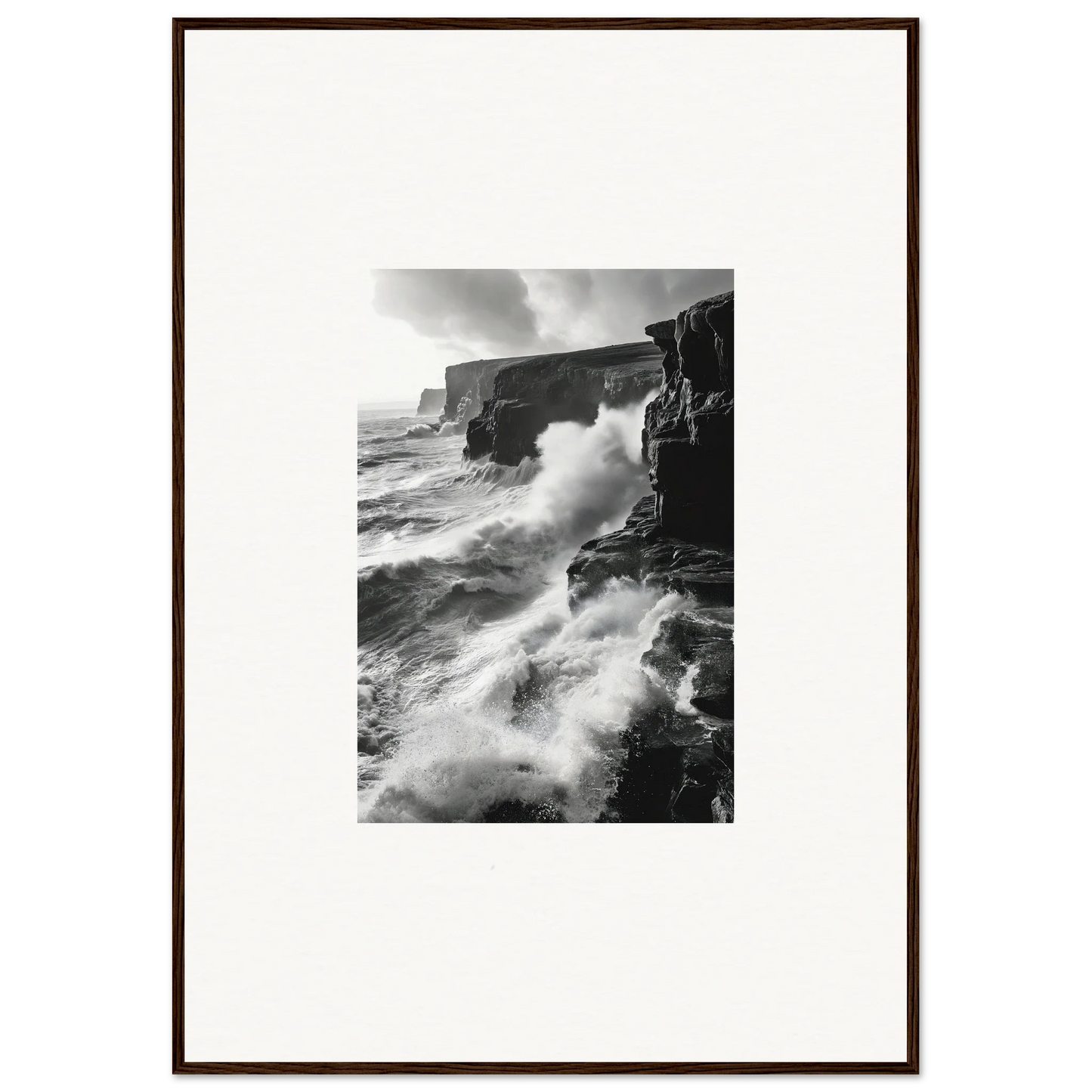 Dramatic waves crash on cliffs, showcasing Tempestuous Rock Ballet in black and white