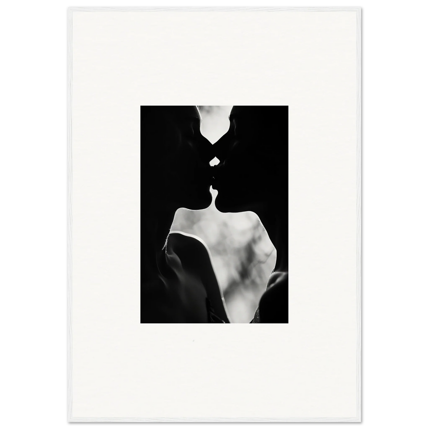 Black and white silhouette of a couple kissing in Shadowy Dawn Nuance framed wall art