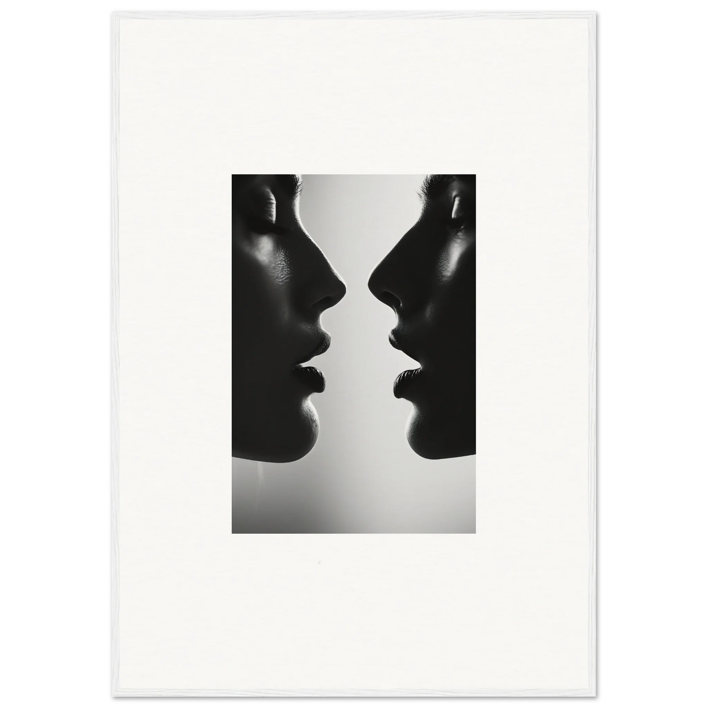 Silhouetted profiles in black and white for Echo’s Embrace premium framed wall art