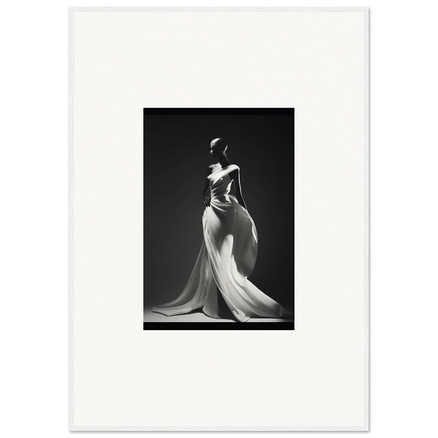 Elegant black and white shot of Gossamer Ivory Whispers evening gown with flowing fabric