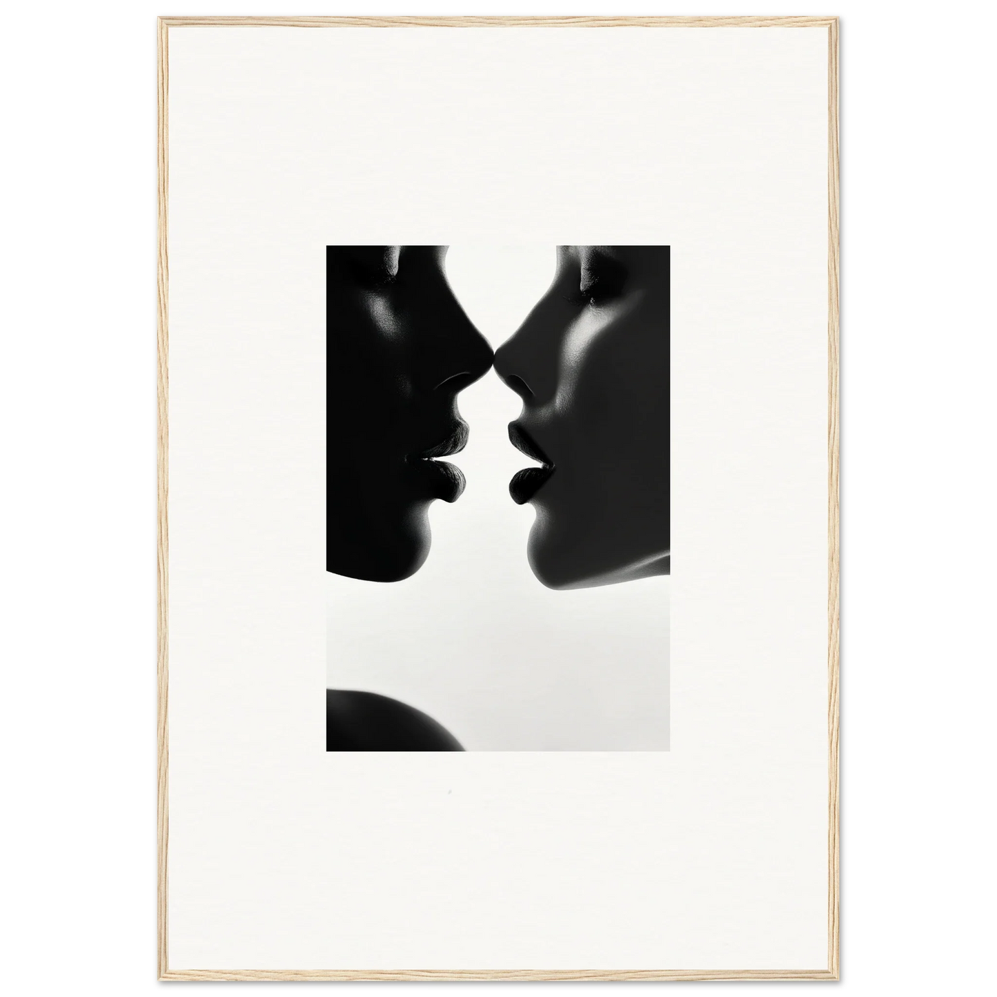 Two silhouetted profiles in intimate pose on a premium framed wall art piece