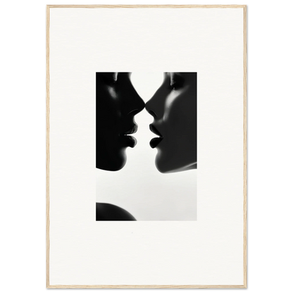 Two silhouetted profiles in intimate pose on a premium framed wall art piece