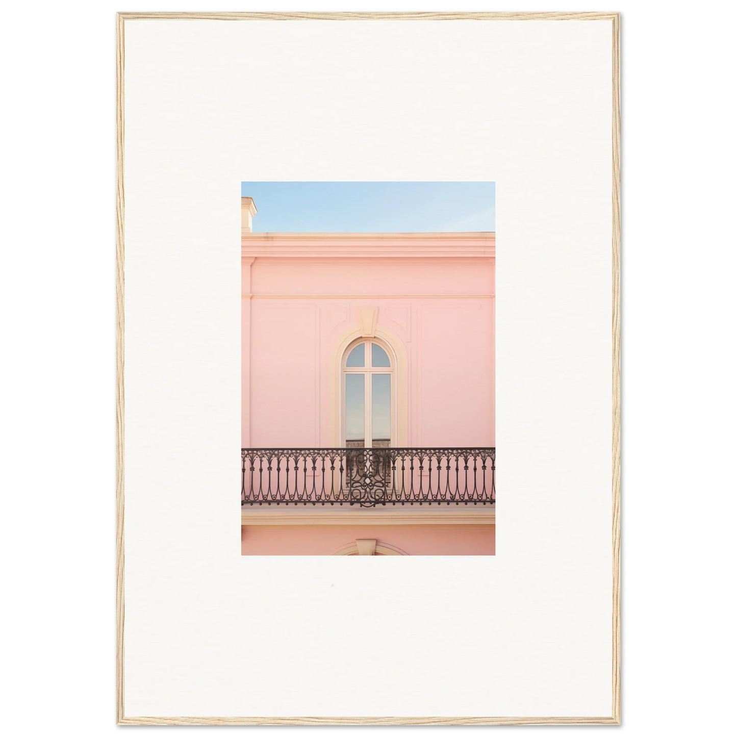 Arched window with ornate balcony railing on a pink wall from Peach Tranquil Portal