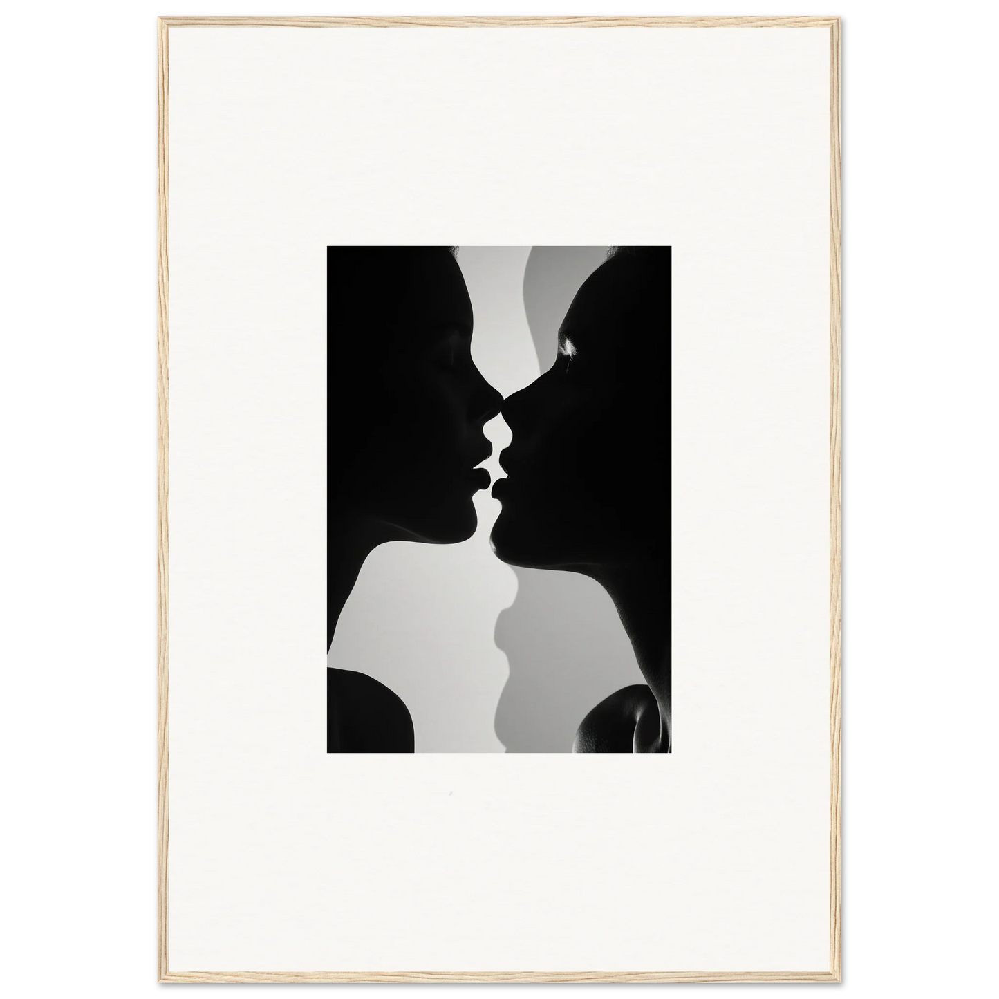 Black and white silhouettes of two profiles almost kissing in Nouveau Love Symphony framed wall art