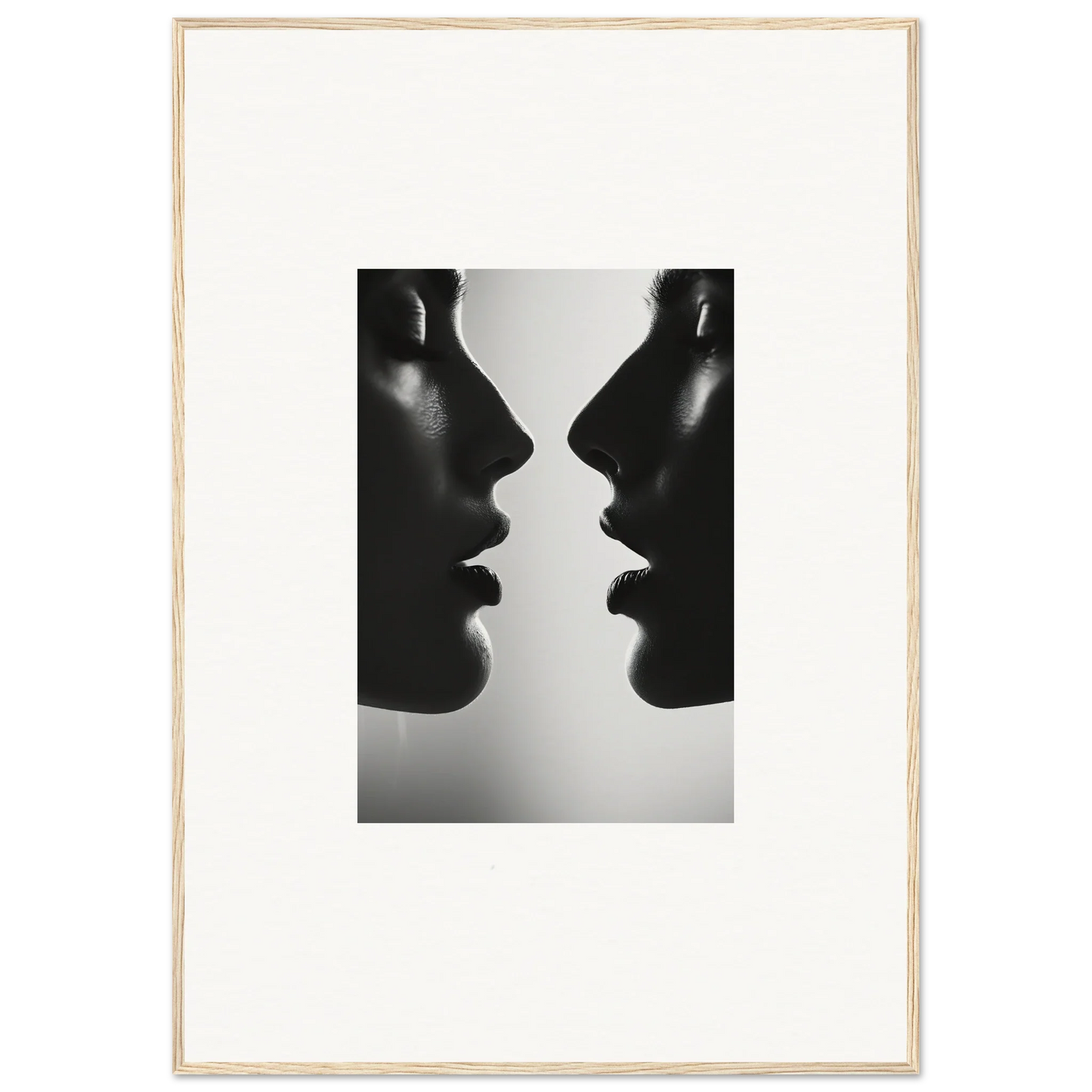 Two silhouetted profiles in black and white from Echo’s Embrace special edition art™