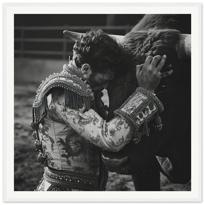 Bullfighter in ornate jacket embracing a bull in Graceful Reverie Duet framed poster