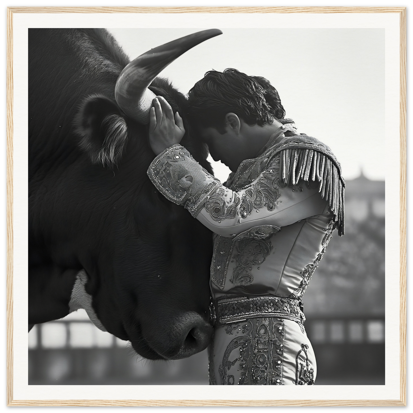 Matador in ornate suit embraces bull’s head, capturing Sul T Toreador’s Reverie moment