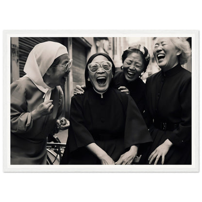 Four women laughing joyfully together.