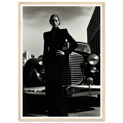 Elegant woman in a long dark coat standing in front of a vintage car.