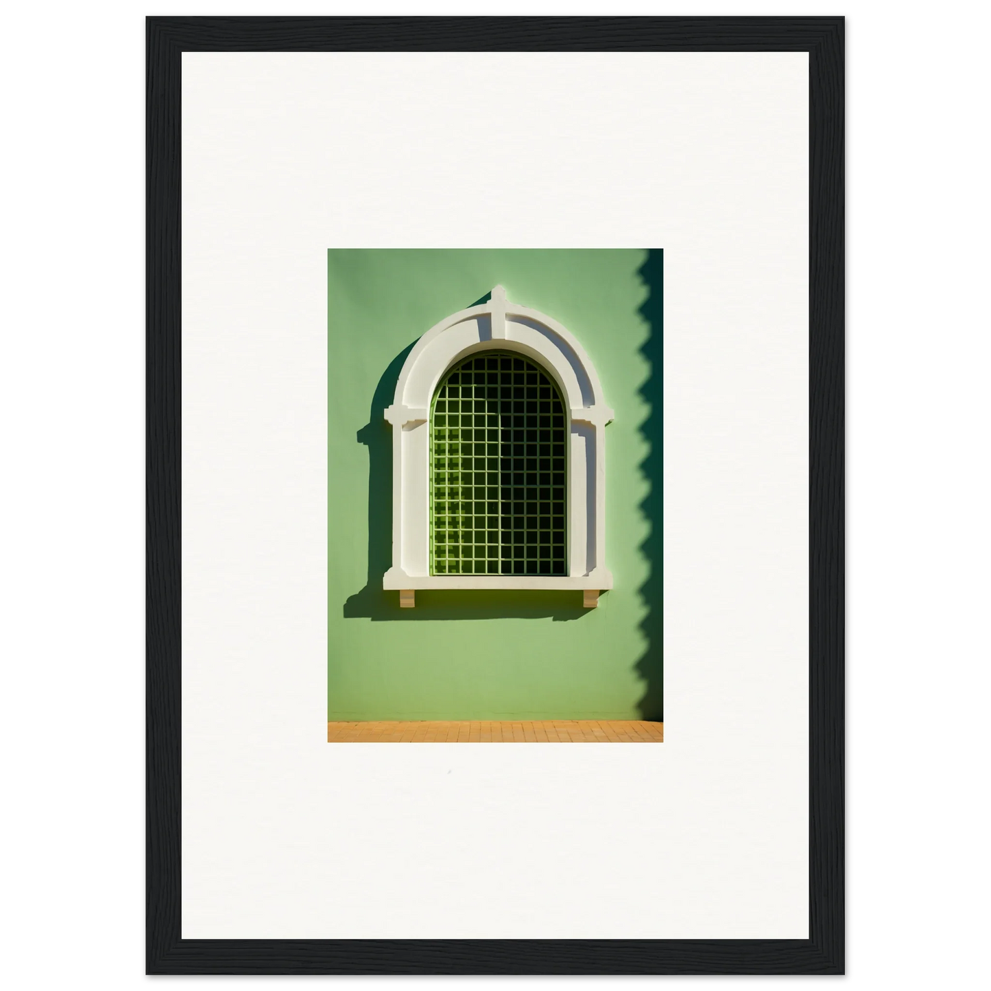 Arched window with white trim and green grating of the Visible Equilibrium Window