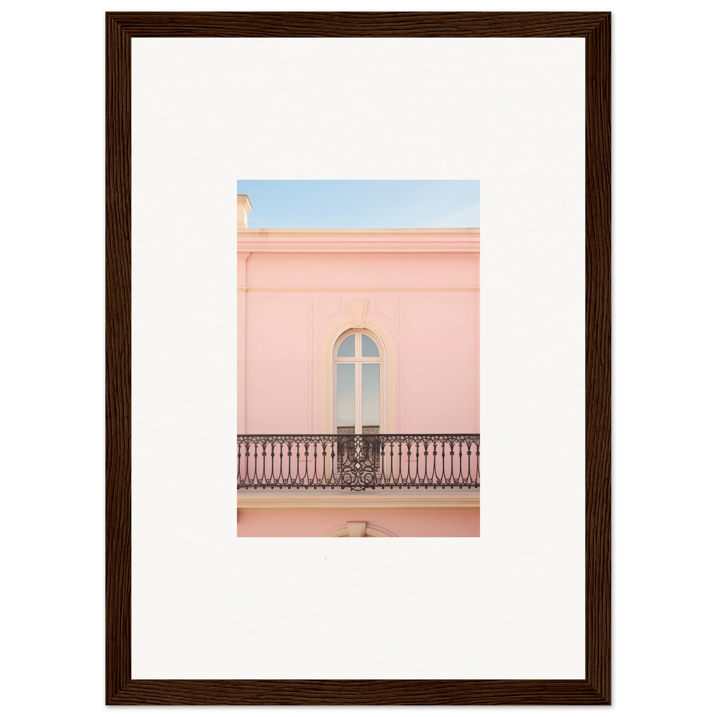 Pink building facade featuring arched window and ornate balcony for Peach Tranquil Portal