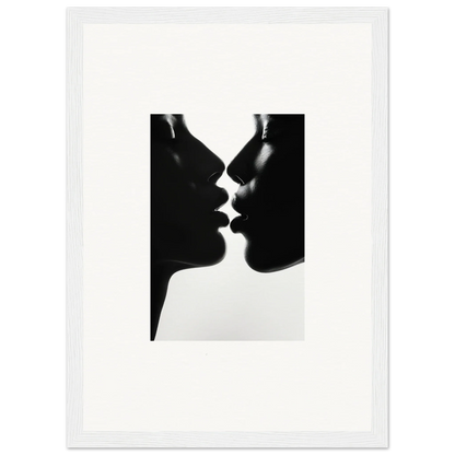 Two silhouetted profiles about to kiss in Luminous Midnight Kiss framed wall art