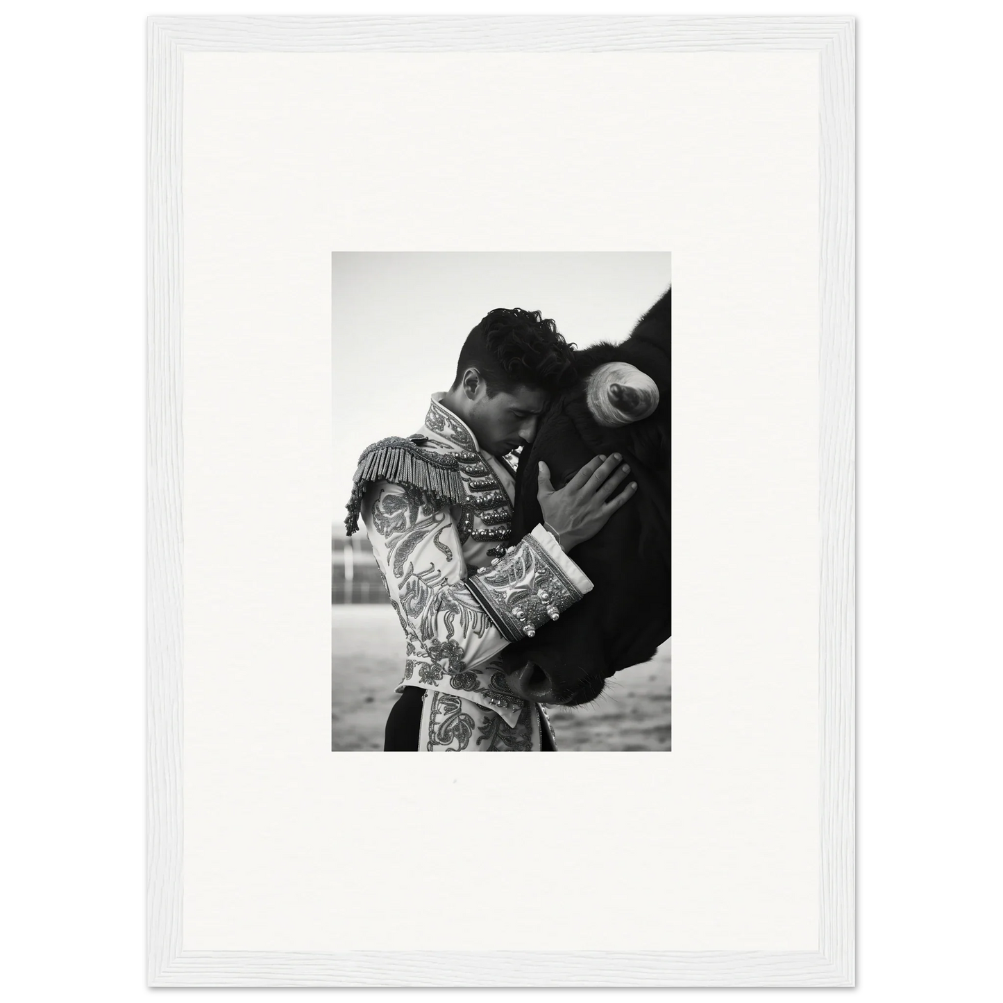 Black and white photo of a matador and bull in Triumphant Shadows Embrace art