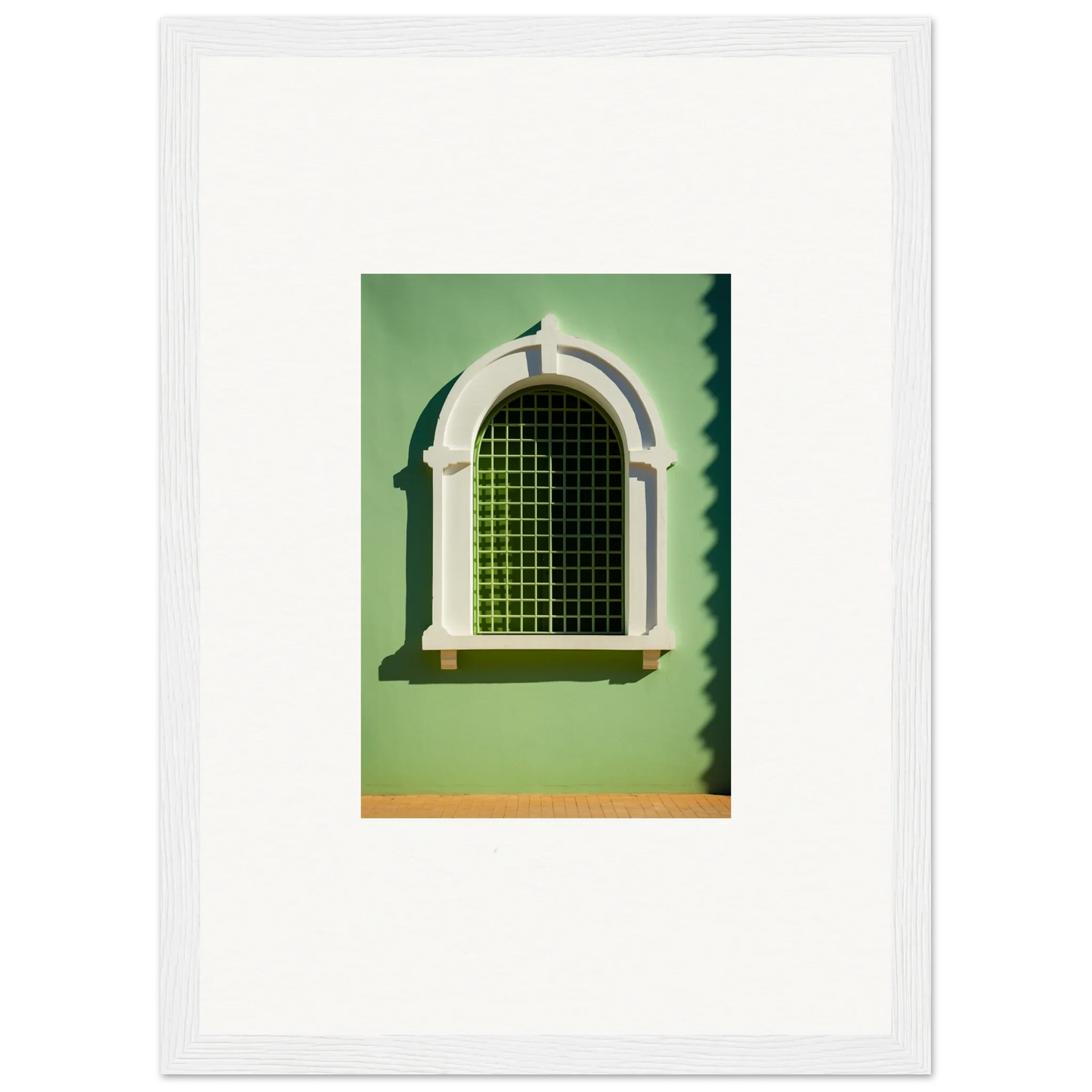 Arched Visible Equilibrium Window features decorative white trim and green metal grating