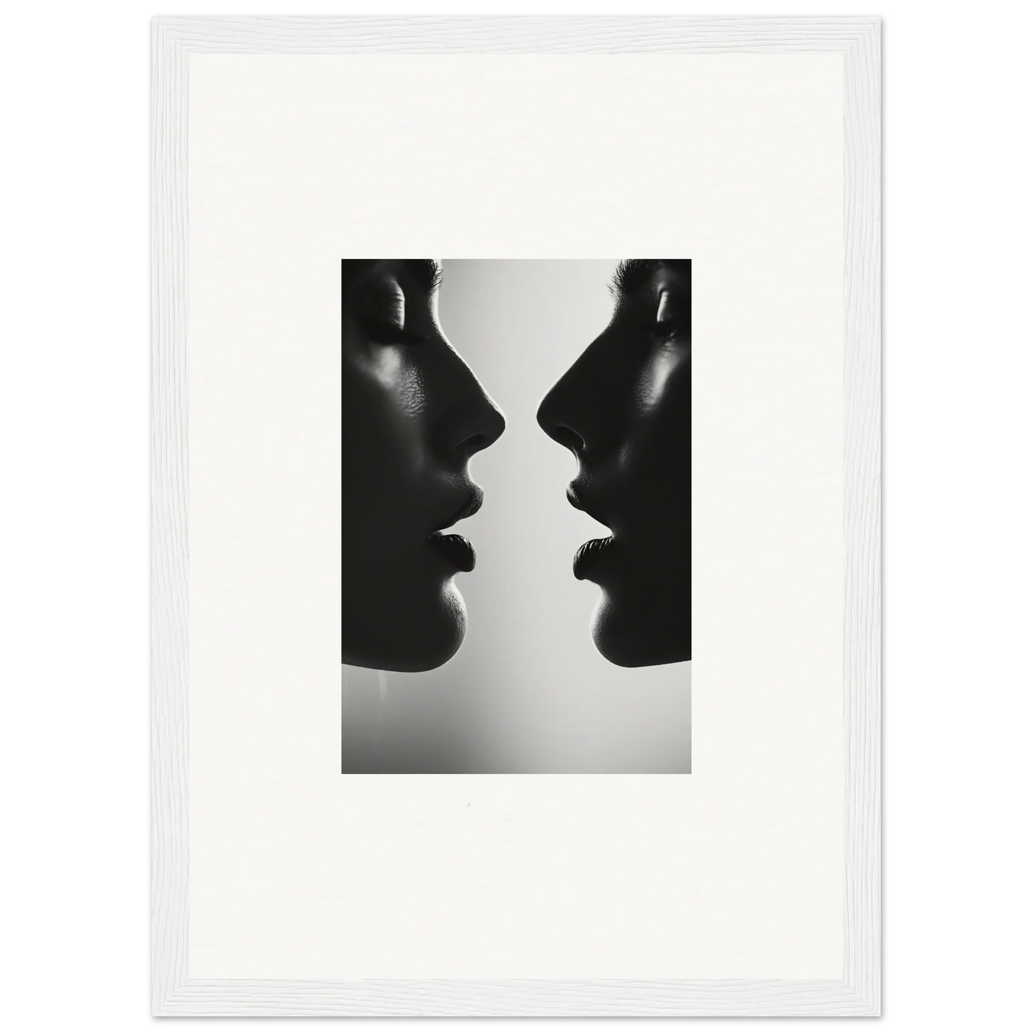 Black and white silhouettes of two profiles in Echo’s Embrace special edition art™