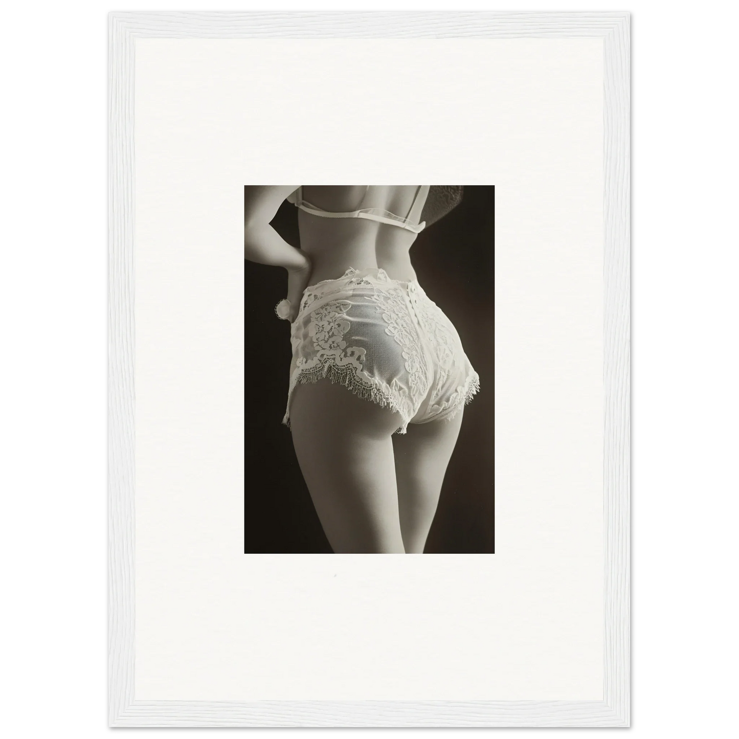 Woman’s lower back in lacy white underwear, perfect for room decoration or wall art