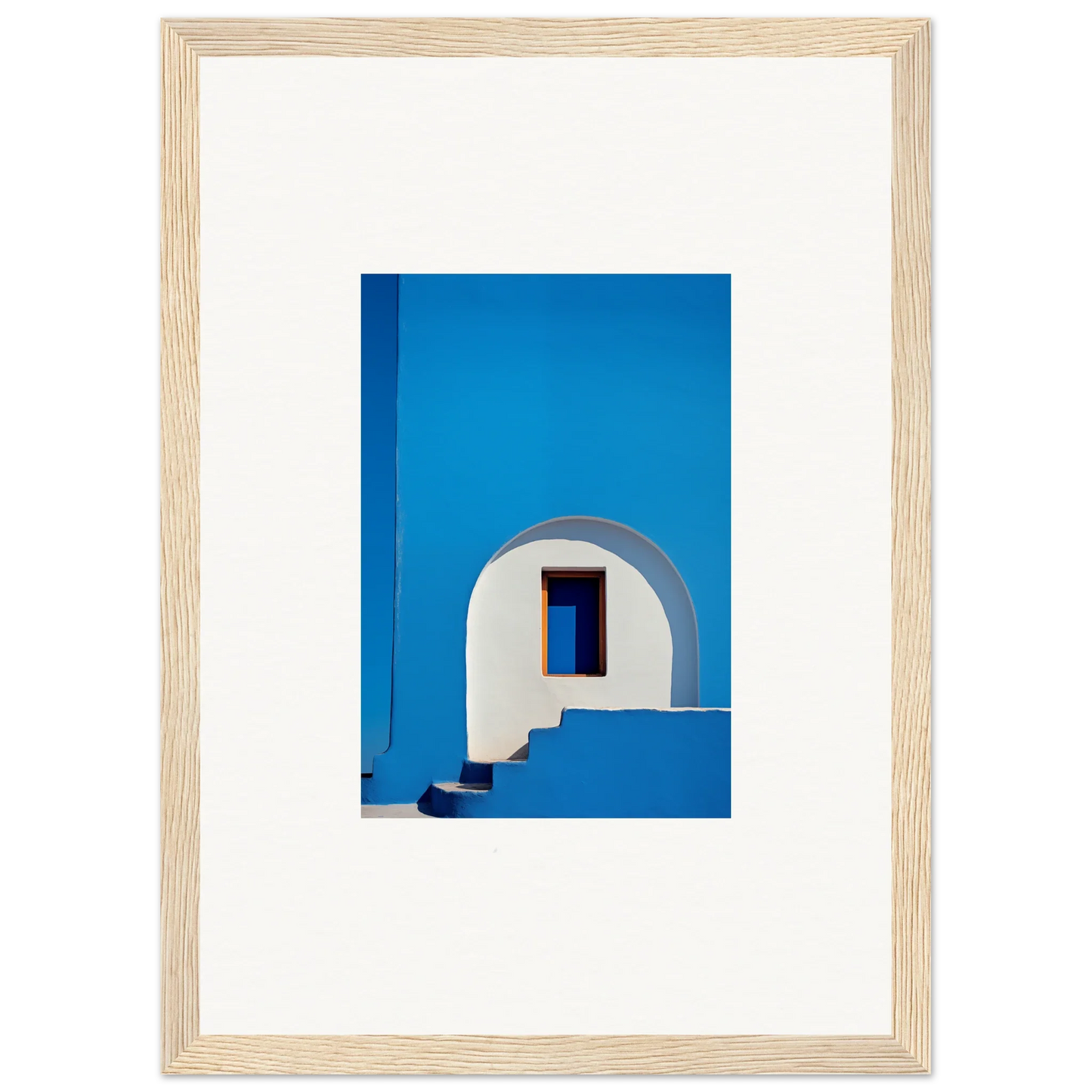 Framed wall art of a white archway on a blue wall from Dreams’ premium framed collection