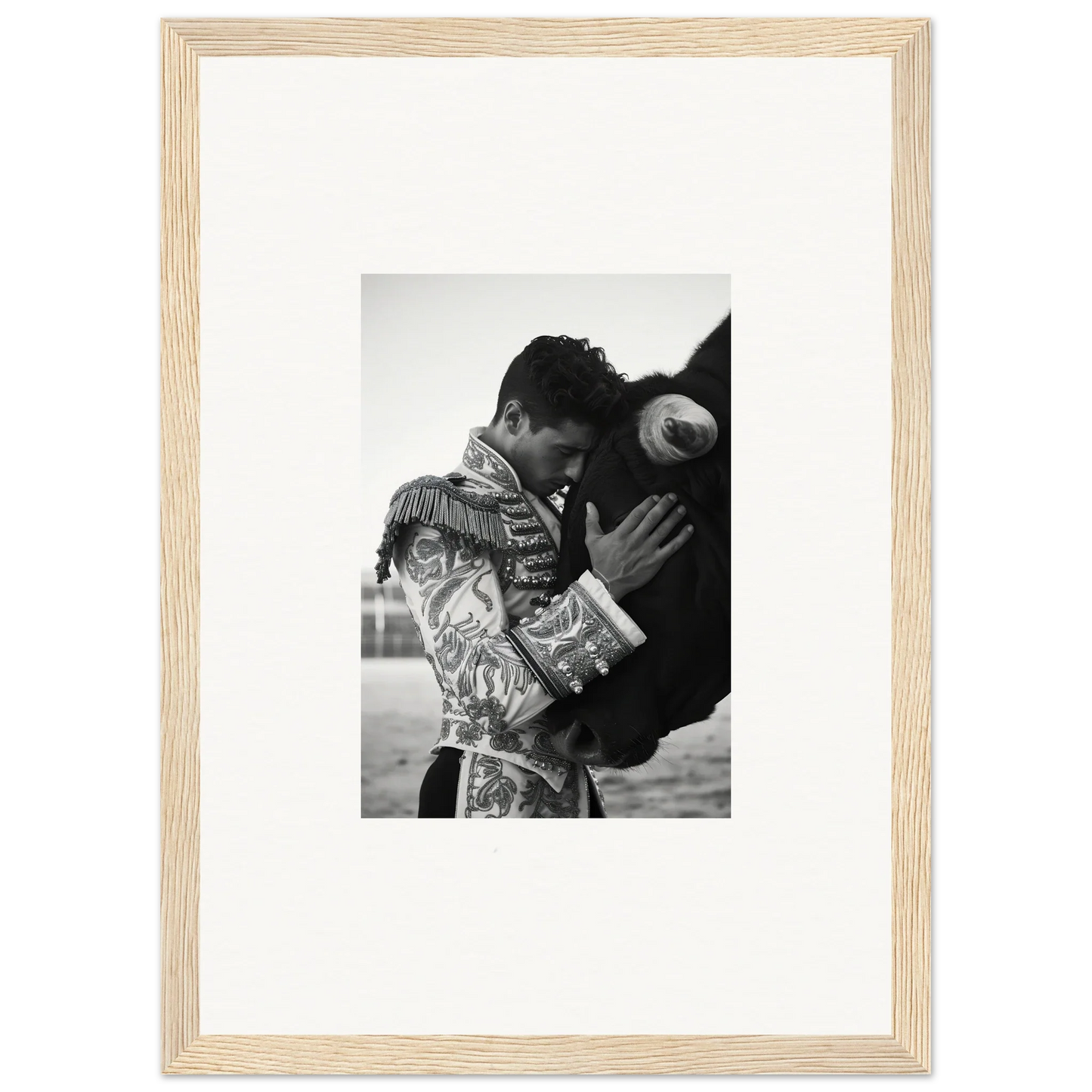 Black and white photo in a light wooden frame from the Triumphant Shadows Embrace special edition art™