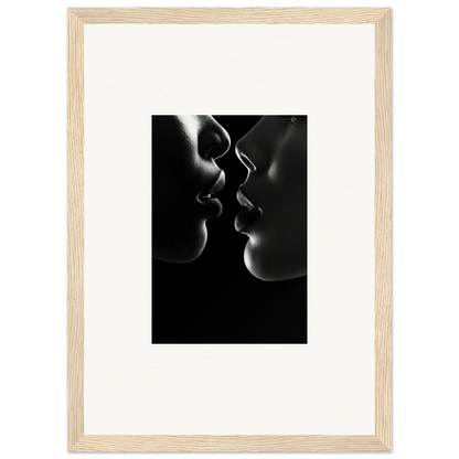 Black and white silhouette of two profiles poised for a kiss - Midnight Kiss Darkness art