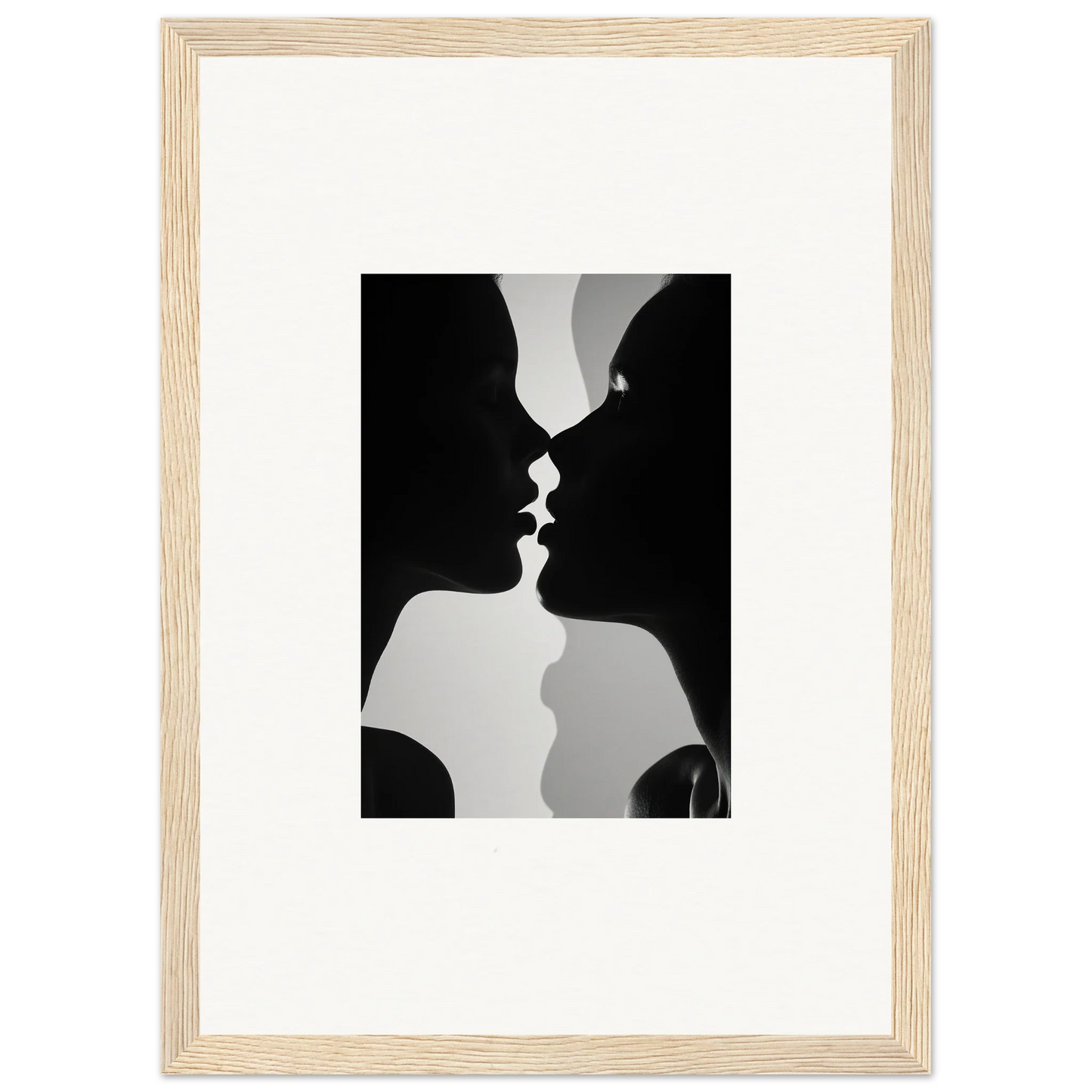 Black and white silhouette of two profiles kissing in Nouveau Love Symphony framed wall art