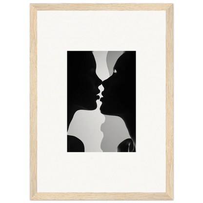 Black and white silhouette of two profiles kissing in Nouveau Love Symphony framed wall art