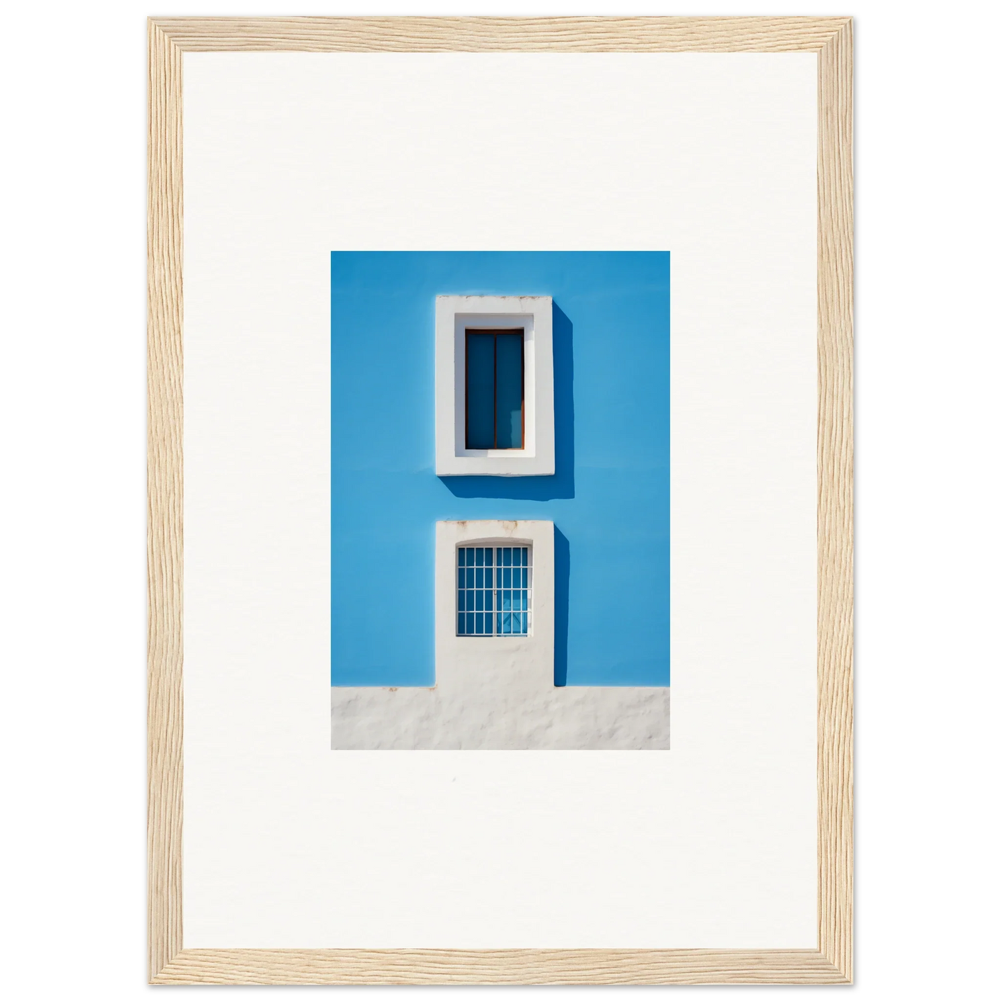 Framed wall art of a bright blue wall and window from Isles Encompassed Vista