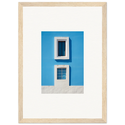 Framed wall art of a bright blue wall and window from Isles Encompassed Vista