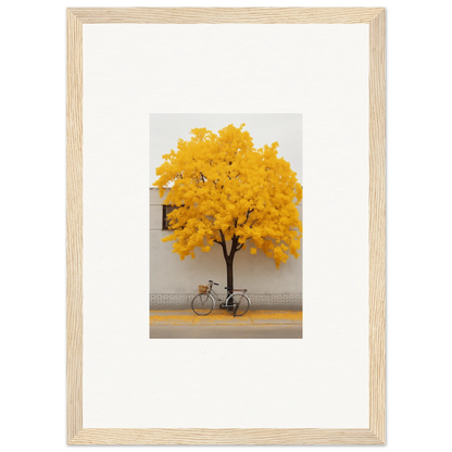 Framed wall art of a bicycle under a yellow-leafed tree in Lemonade Gaze Reverie