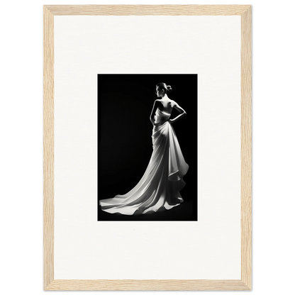 Elegant flowing evening gown in a wooden frame showcasing ephemeral grayscale elegance