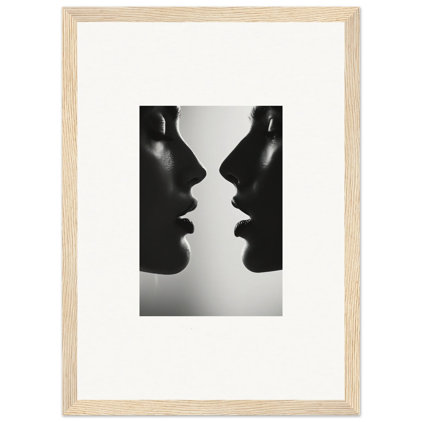 Two silhouetted profiles in black and white from Echo’s Embrace Special Edition Art™