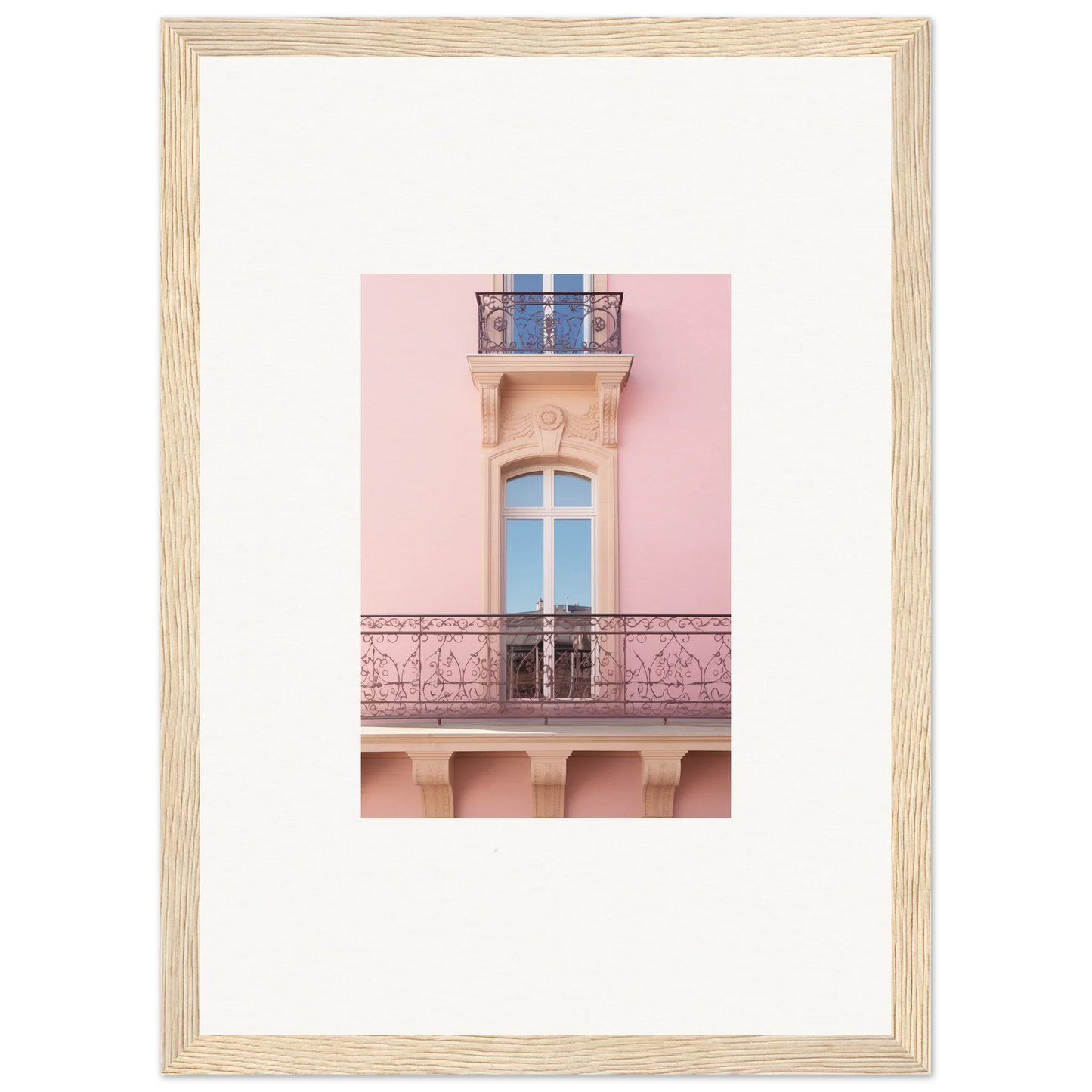 Framed wall art of a pink building’s ornate balcony with dusky dream balustrade